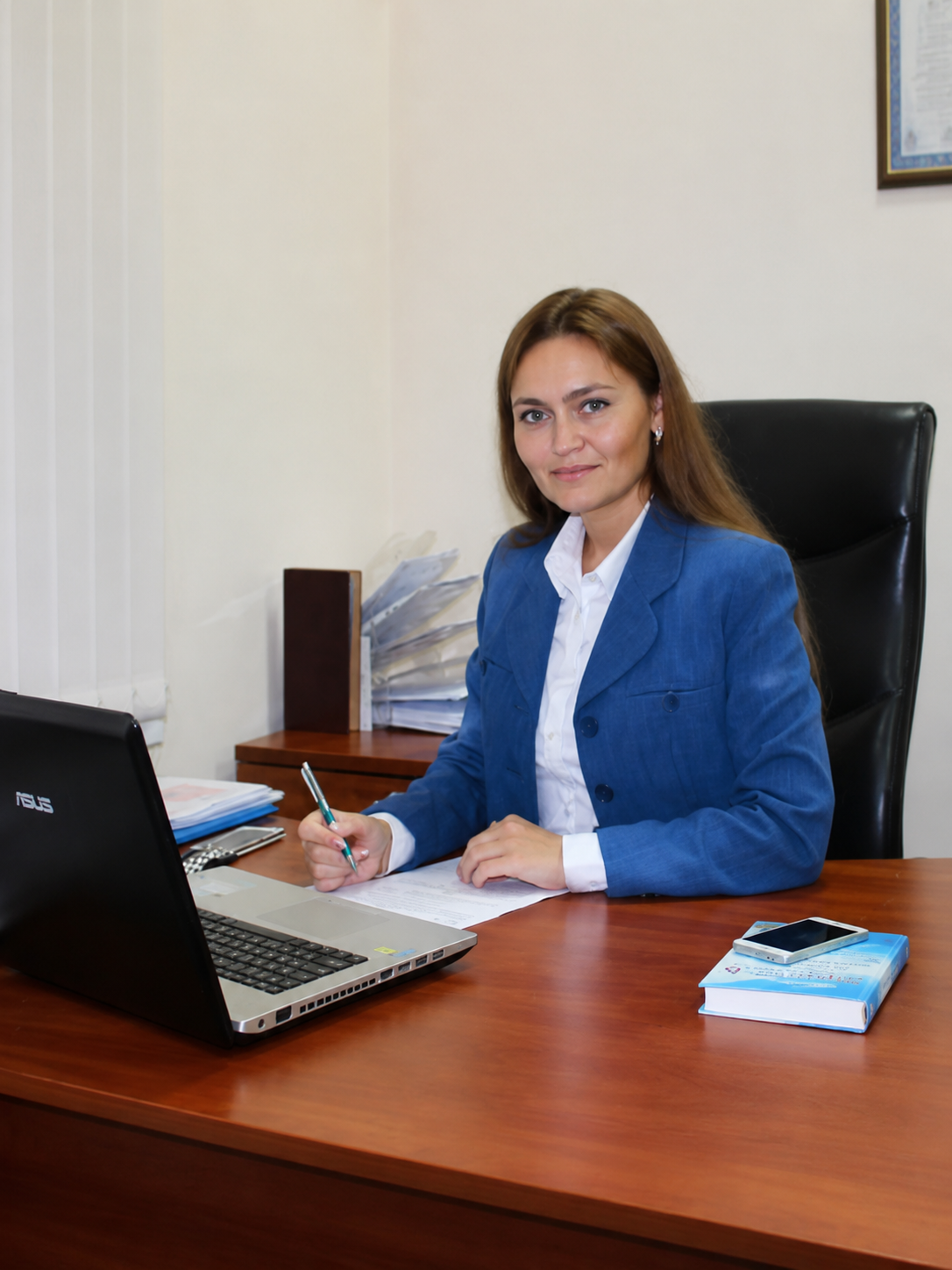 Трякина Ксения Петровна за рабочим столом